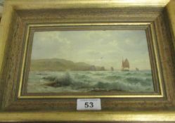 An oil on board seascape, signed but indistinct, frame 32.5 x 23cm, image 22 x 12.5cm