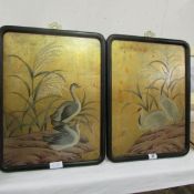 A pair of Oriental panels depicting birds, 53 x 41cm
