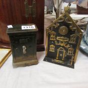2 money boxes including one with French instructions