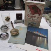 A quantity of Queen Mary related ephemera including perpetual calendar, wine list etc