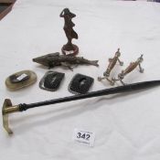 A mixed lot including knife rests, articulated fish, figure etc
