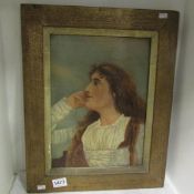 A framed oil on canvas portrait of a young woman