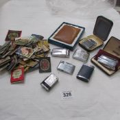 A quantity of lighters including WWII 'Eritrea' lighter and old matchbooks