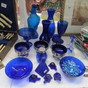 A quantity of blue glassware