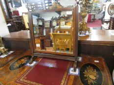 A mahogany toilet mirror