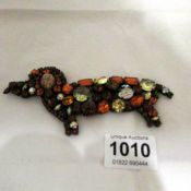A Butler and Wilson jewelled dog (15cm)