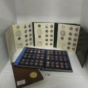 4 albums of of USA coins and an Eisenhower proof dollar
