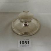A HM silver inkwell marked Finnigan's Manchester