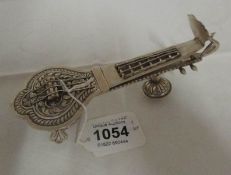 An Indian silver box in the shape of a sitar (possibly a drug box)