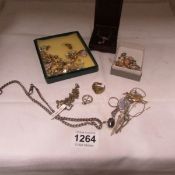 A quantity of costume jewellery including gold and watch chains