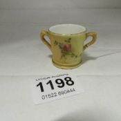 A Royal Worcester miniature loving cup