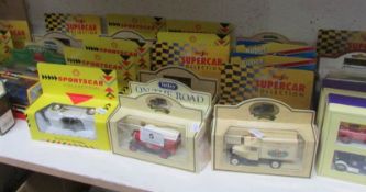 A quantity of boxed diecast cars, mainly Shell and Lledo etc