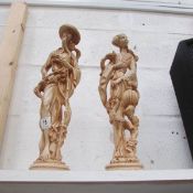 A pair of resin oriental figures