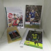 A signed photo of Seamus Coleman, Luke Shaws and 2 match programmes one being signed