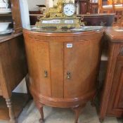 A dome fronted cabinet