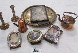A miniature copper kettle, candlesticks, photo frames etc