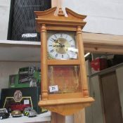 A pine wall clock