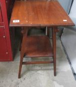 A mahogany occasional table