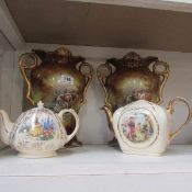 A pair of early 20th Century vases with cattle scene depiction and 2 teapots including early Sadler