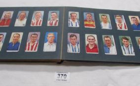 A Will's cigarette card album including military sets