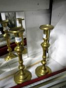 A large pair of brass candlesticks