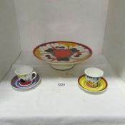 A Clarice Cliff for Wedgwood large comport and 2 cups & saucers