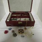 A jewellery box with contents