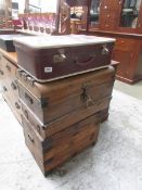 A wooden box, tin trunk and old suitcase