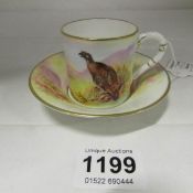 A Royal Worcester James Stinton coffee cup and saucer - game birds