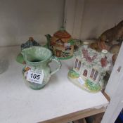 A Staffordshire cottage, cottage cruet set, teapot and jug