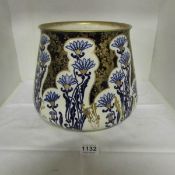 A large Doulton Burslem gilded blue and white jardiniere