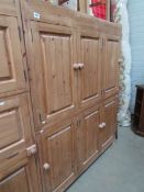 A large old pine cupboard