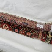 A 100% wool hand woven Persian Village Hamadan rug (approx. 150 x 98cm)