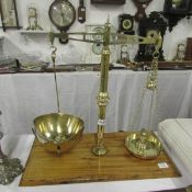 A set of brass beam scales from Howard  Bulloughs Engineering Works, Acrington