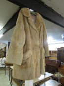 A fur three quarter length coat