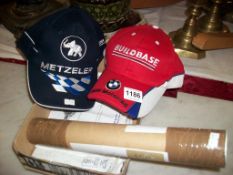 A signed photo of Jay Vincent, A Metzeler Tyres racing cap and a Buildbase BMW racing cap
