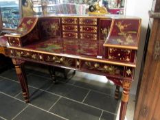 A Carlton House desk decorated with birds and flowers