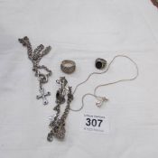 A quantity of silver including rings and charm bracelet