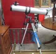 A Celestron telescope on tripod