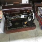 A cased Singer sewing machine