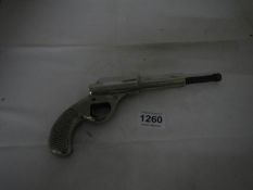 An early dollar-style gun