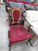 An Edwardian arm chair