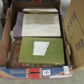 A box of old books and deeds