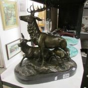 A bronze stag group