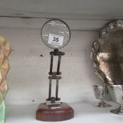 A magnifying glass on stand