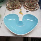 A Beswick Art Deco ashtray with Babycham Motif in turquoise and white