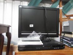 A flat screen TV and DVD player