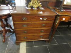 A small mahogany 4 drawer chest