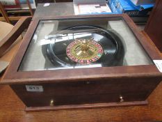 A cased roulette game