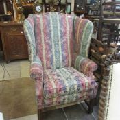 A wing back chair